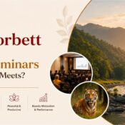Banner highlighting why Jim Corbett is ideal for MLM seminars and success meets, featuring a river landscape, tiger, and meeting.